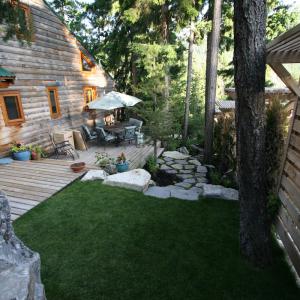 Whistler side yard landscape with stone pathway and garden beds